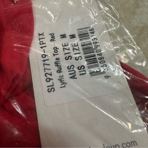 Lyric Ruffle Cotton Babydoll Top
Petal & Pup red - Picture 5 of 5